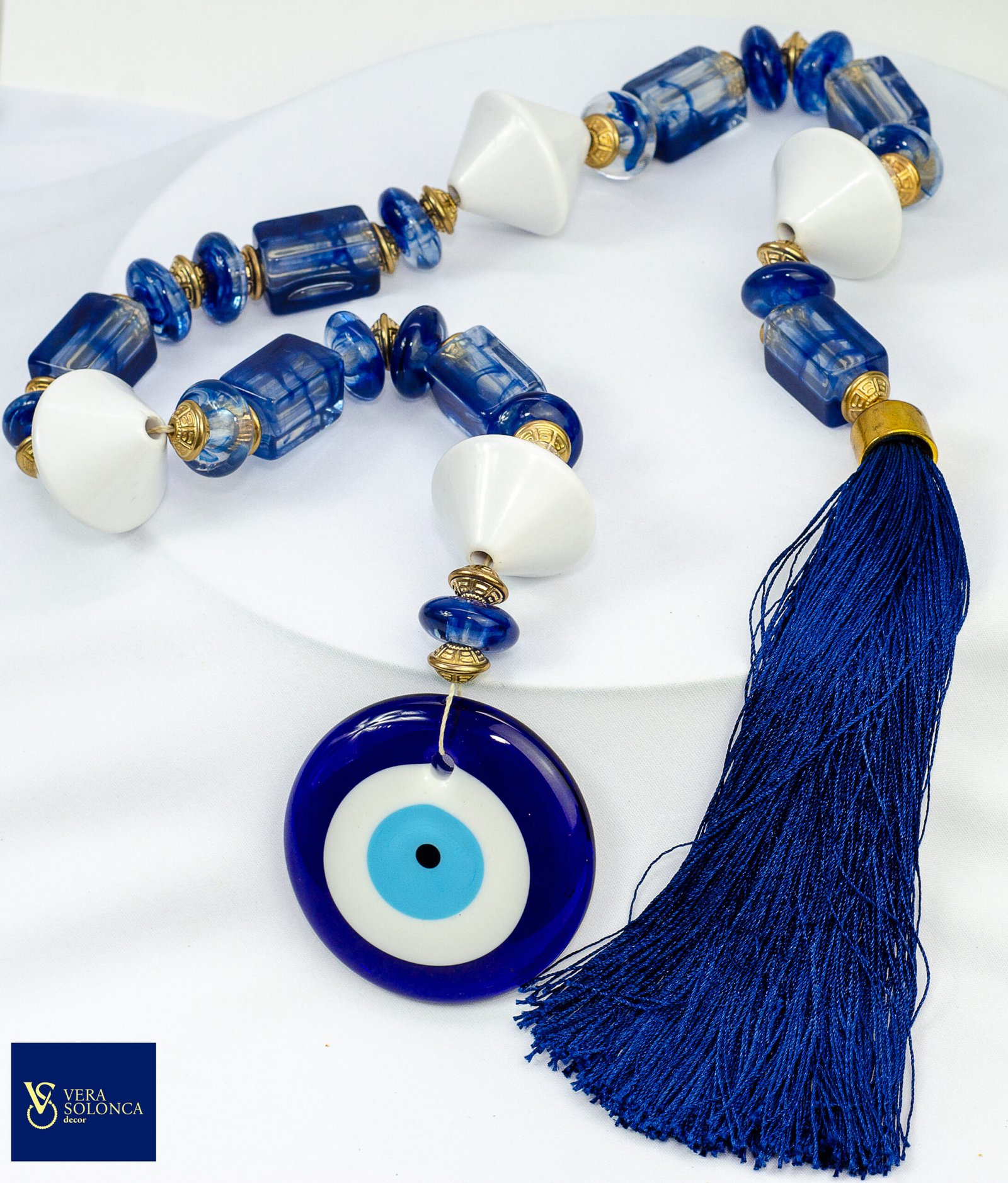 Colar de mesa com olho grego grande